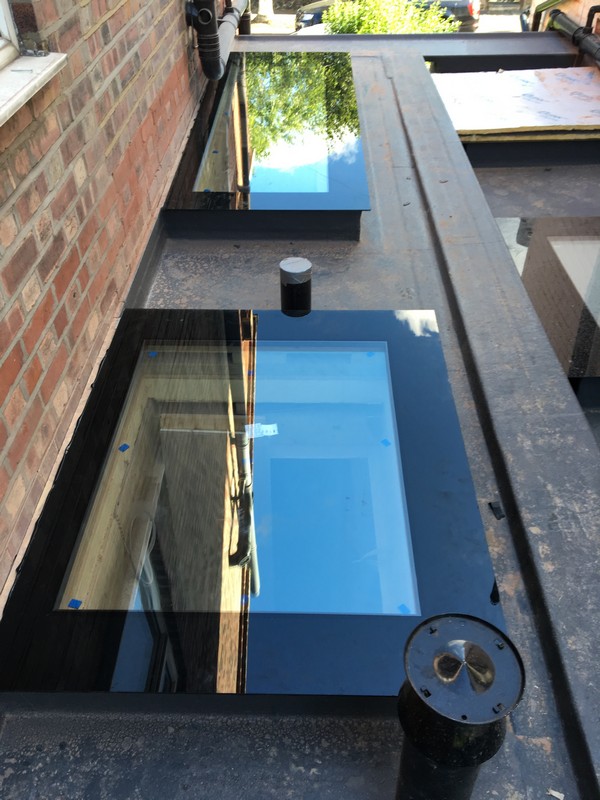 Multiple flat roof skylights on extension in Waterloo